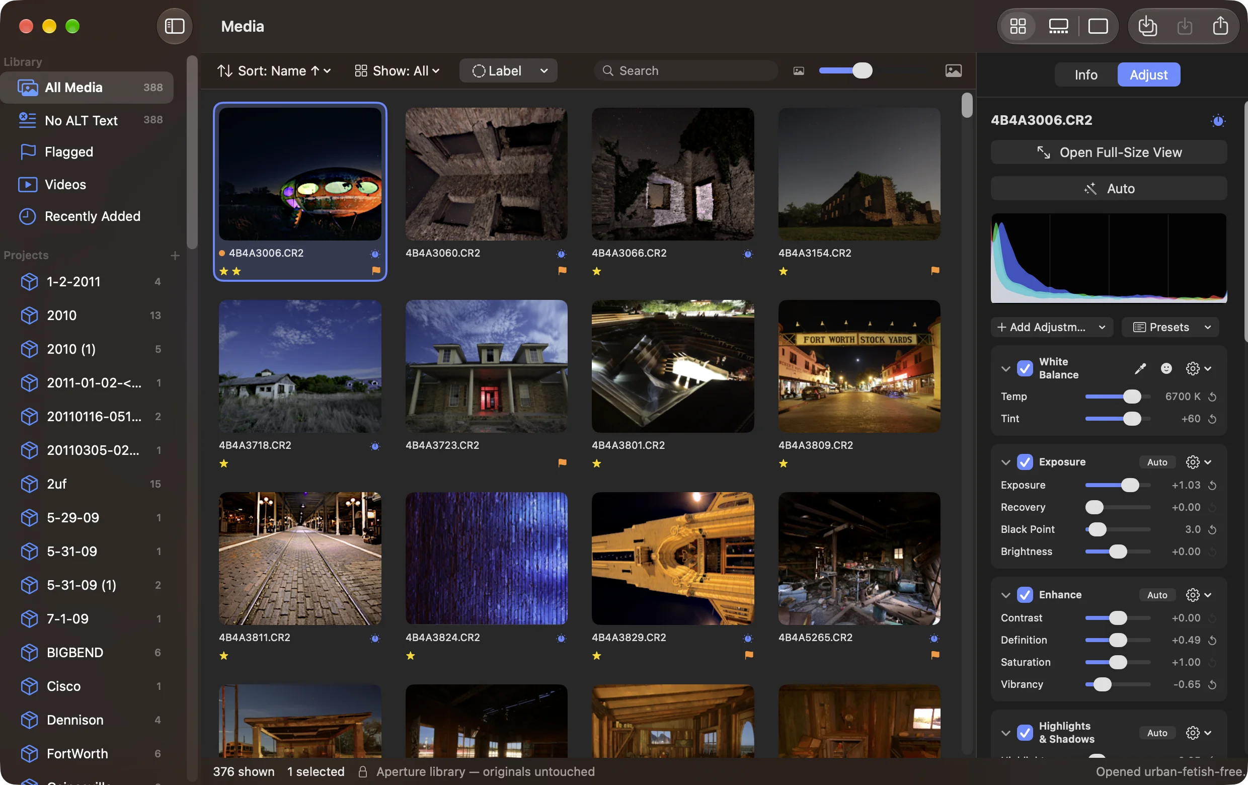 Alter’s browser showing an Aperture library: a grid of night and urban-exploration photos — a Futuro house, a ruined stone building, a lit downtown street, an old hotel — each with its filename, star rating and colour label. The sidebar lists Library items and a long list of Aperture projects with photo counts. The Futuro house is selected and the Adjust inspector on the right shows its White Balance, Exposure, Enhance and Highlights & Shadows bricks.