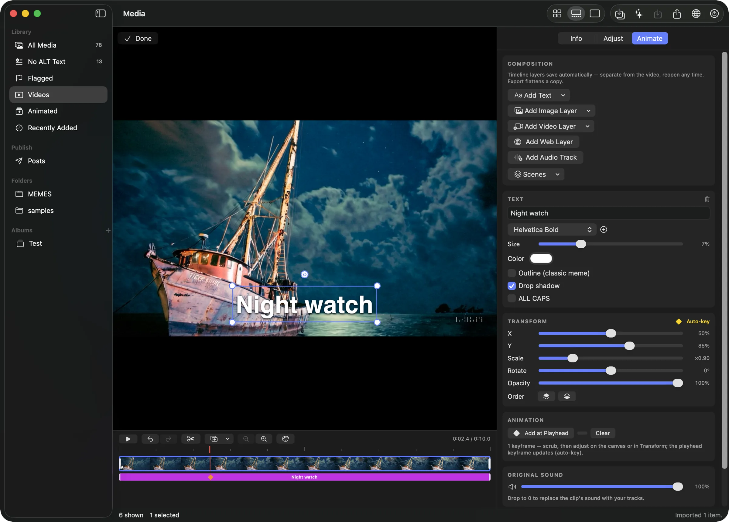 The Animate editor: a night timelapse of a fishing boat under moving clouds fills the canvas, with a styled caption reading “Night watch” selected, showing corner scale handles and a rotation knob. Below, the timeline shows a ruler with a red playhead, the clip’s filmstrip track, and a purple text-layer bar carrying a yellow keyframe diamond. The inspector on the right holds the text style, transform, and animation controls.