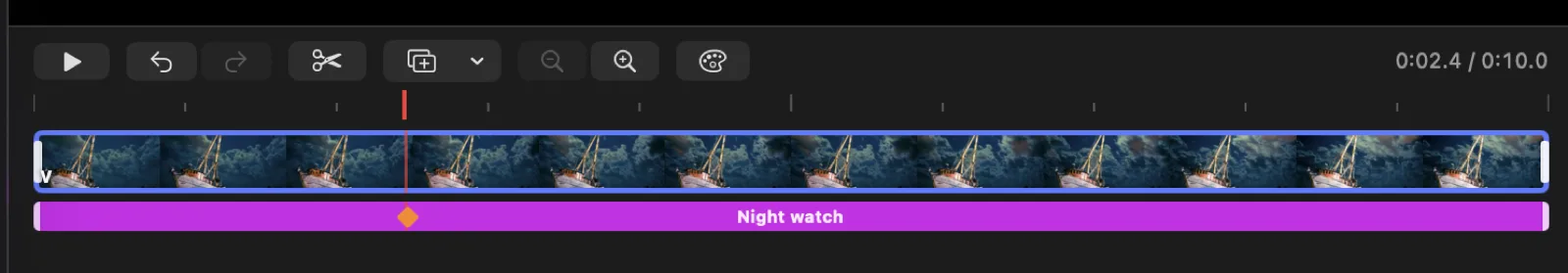 Close-up of the timeline tracks: a ruler with per-second ticks and a red playhead, the clip’s filmstrip showing the boat repeating across the track, and beneath it a purple text-layer bar labelled “Night watch” carrying a yellow keyframe diamond.